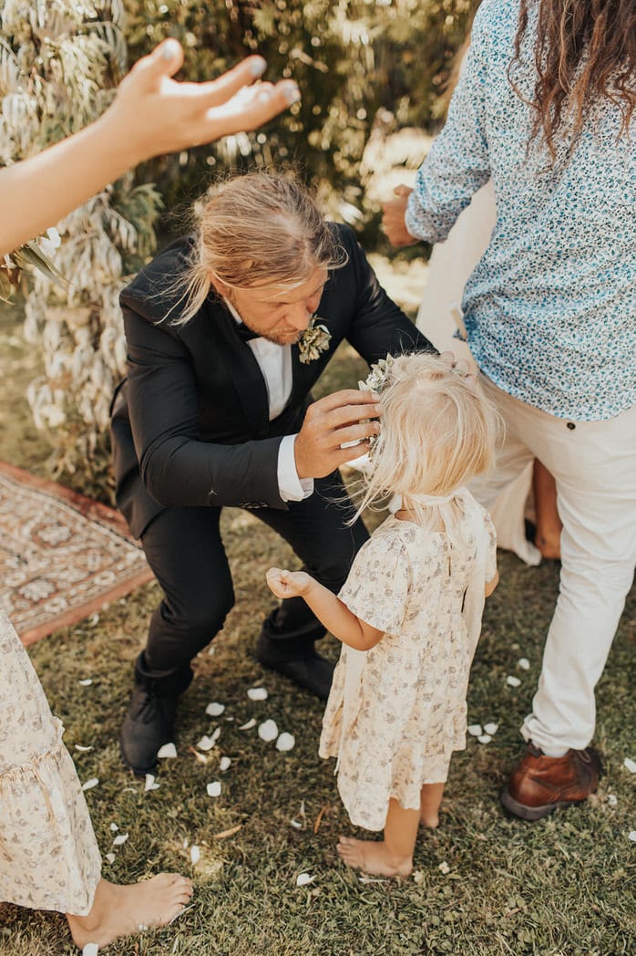 Nicole and Choppie - Gisborne Wedding captured by Oriwia Soutar.
Free spirit in her Daughters of Simone gown; a seventies silhouette, fluted sleeves. Bohemian bride. Featured on Wild Hearts, New Zealand. Flower girl. 