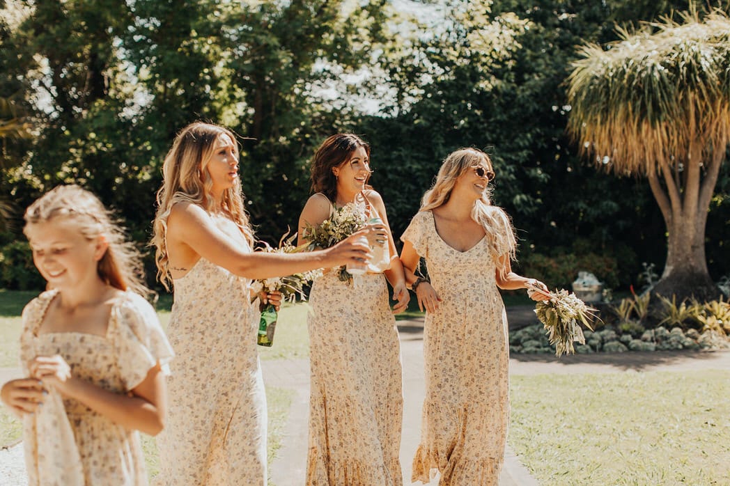 Nicole and Choppie - Gisborne Wedding captured by Oriwia Soutar.
Free spirit in her Daughters of Simone gown; a seventies silhouette, fluted sleeves. Bohemian bride. Featured on Wild Hearts, New Zealand. Bridesmaids. 