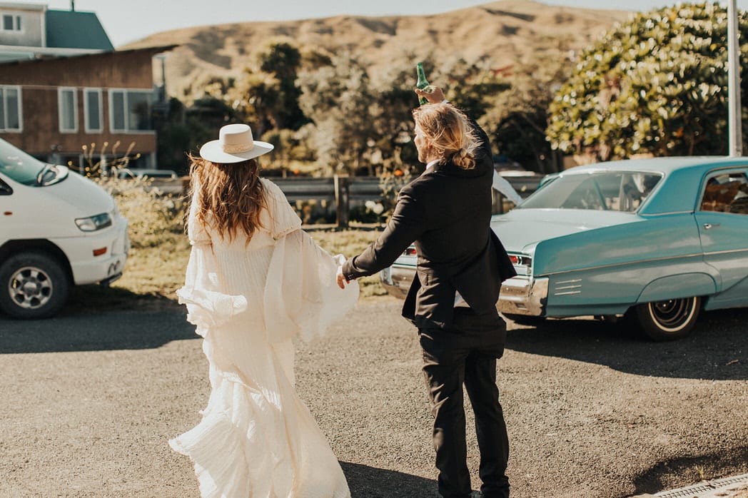 Nicole and Choppie - Gisborne Wedding captured by Oriwia Soutar.
Free spirit in her Daughters of Simone gown; a seventies silhouette, fluted sleeves. Bohemian bride. Featured on Wild Hearts, New Zealand. 